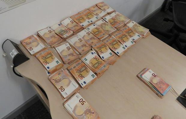 mark_adams_cash-Some of the cash seized in Adams luggage at Belfast International Airport. mark_adams_cash-Some of the cash seized in Adams luggage at Belfast International Airport